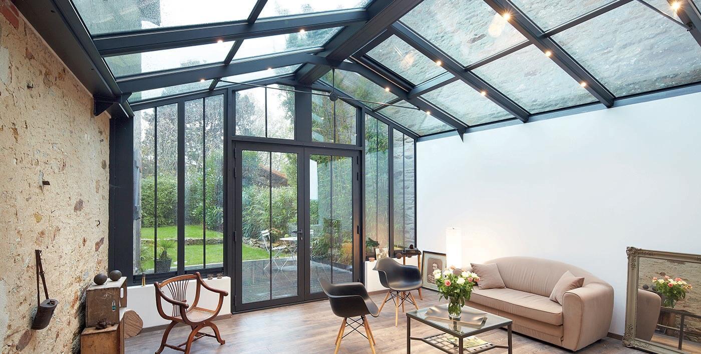 Véranda aluminium sur mesure réalisée par APS Menuiserie
